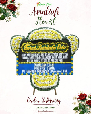 Papan Bunga Duka di Batang Alai Timur